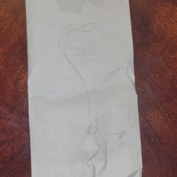 The hair found in the food.  The paper is the order receipt