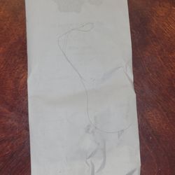 El Paso Grill - The hair found in the food.  The paper is the order receipt
