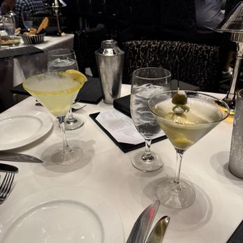 Mastro's Steakhouse - Lemon drop martini and slightly dirty vodka martini with blue cheese stuffed olives. - Steakhouses Near Me - Columbus, Ohio