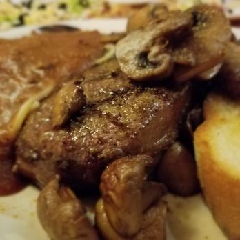 Coliseum Pizza & Steak - New york steak with buttered mushrooms, spa6with homemade meat sauce - Steakhouses Near Me - Edmonton, Alberta