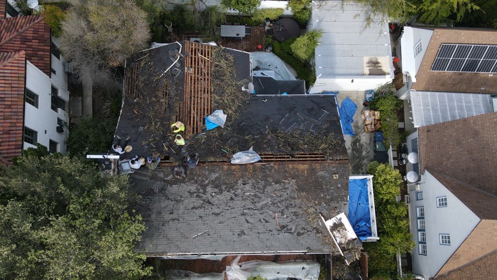 Slide of Rafael and Iris Roofing