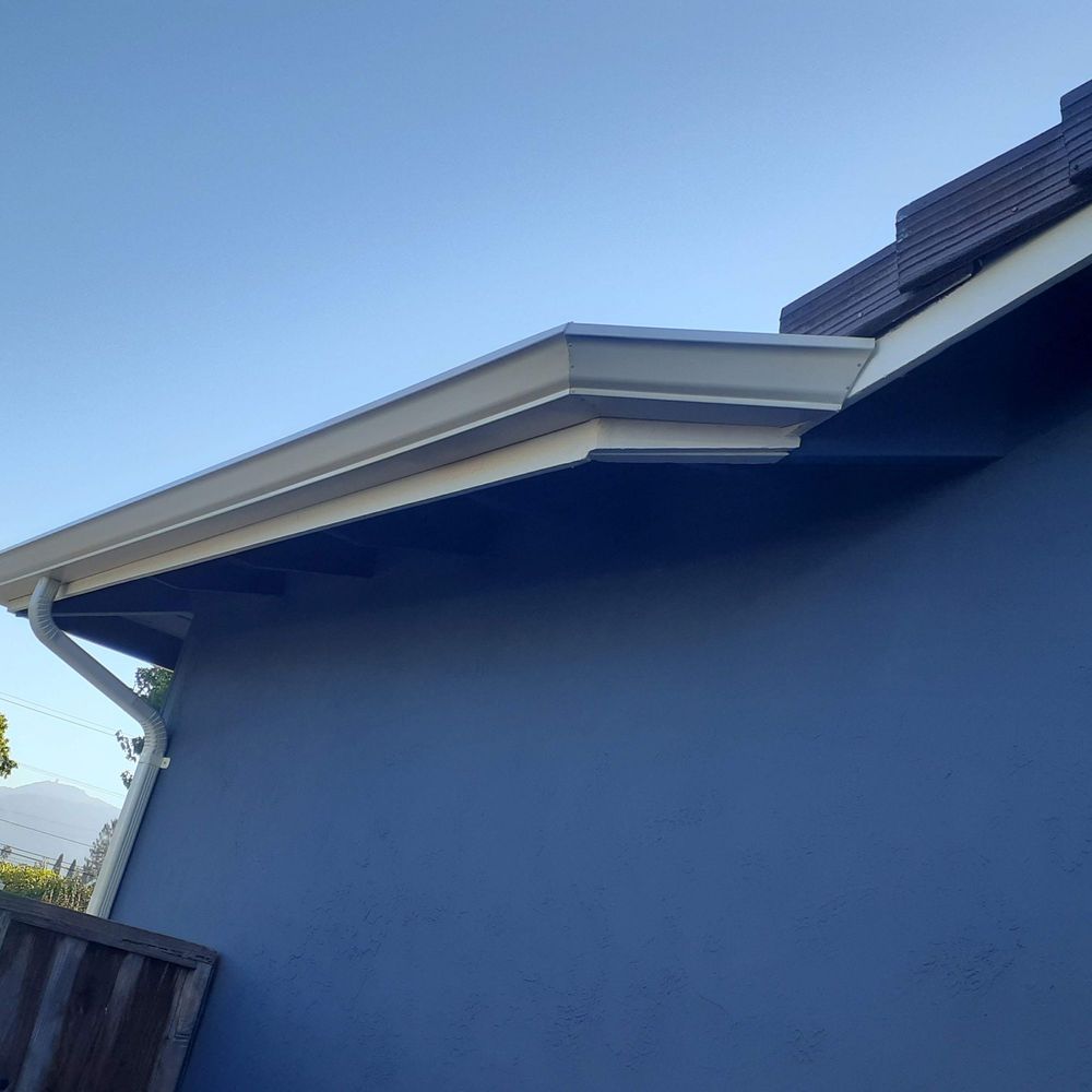 Slide of JB Rain Gutter installation