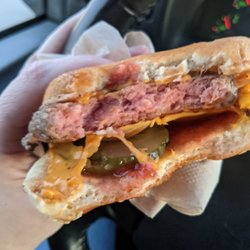 McDonald's - Raw, bloody bun quarter pounder.