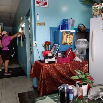 808 Grindz Cafe - note cash only sign on the refregerator. Keiea wearing red Hoka shoes - Cafes Near Me - Lahaina, Hawaii 808 Grindz Cafe - note cash only sign on the refregerator. Keiea wearing red Hoka shoes - Cafes Near Me - Lahaina, Hawaii