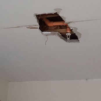 Walltech Drywall Services - garage ceiling damage - General Contractors Near Me