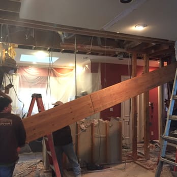 Load Bearing Wall Pros - One of several load bearing beams ready to be installed. - General Contractors Near Me - Plano, Texas Load Bearing Wall Pros - One of several load bearing beams ready to be installed. - General Contractors Near Me - Plano, Texas