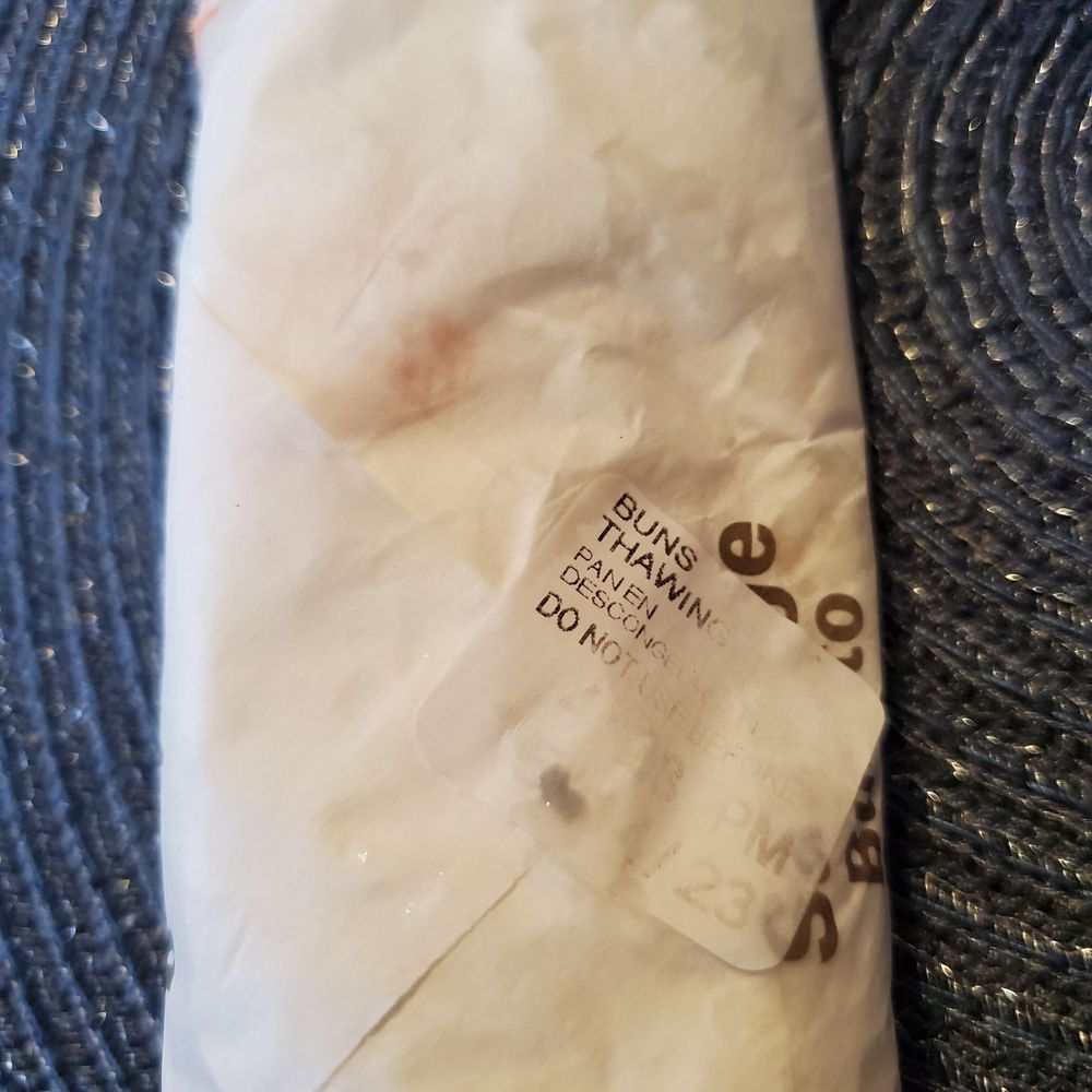 Buns thawing sticker used to seal the food instead of a McDonald's sticker. Gross! Buns thawing sticker used to seal the food instead of a McDonald's sticker. Gross!
