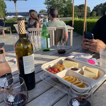 The Wine Stand - Cheese plate - $25  Red blend - $47 Both really good! - Wine Tasting Room Near Me - Sagaponack, New York