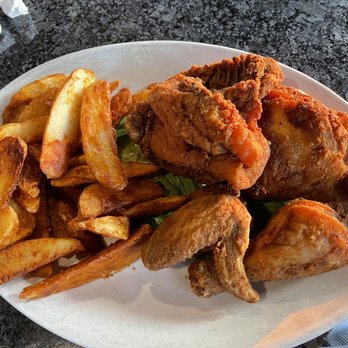 Sunset On the Water - a plate of fried chicken and french fries - Steakhouses Near Me - Fond du Lac, Wisconsin Sunset On the Water - a plate of fried chicken and french fries - Steakhouses Near Me - Fond du Lac, Wisconsin