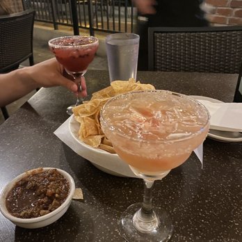 Uncle Julio's - Grapefruit margarita in front, blackberry margarita in back. - Mexican Near Me - Bethesda, Maryland Uncle Julio's - Grapefruit margarita in front, blackberry margarita in back. - Mexican Near Me - Bethesda, Maryland