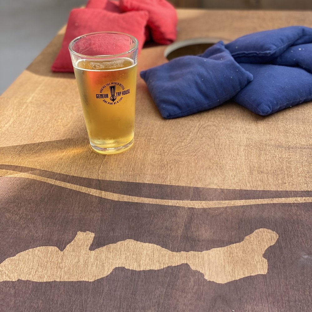 Geneva Taphouse - Corn hole was a must with the group! - Beer Bar Near Me - Lake Geneva, Wisconsin