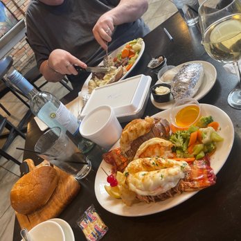 Prime Time Restaurant & Bar - a man eating a meal - American Near Me - Hickory Hills, Illinois Prime Time Restaurant & Bar - a man eating a meal - American Near Me - Hickory Hills, Illinois