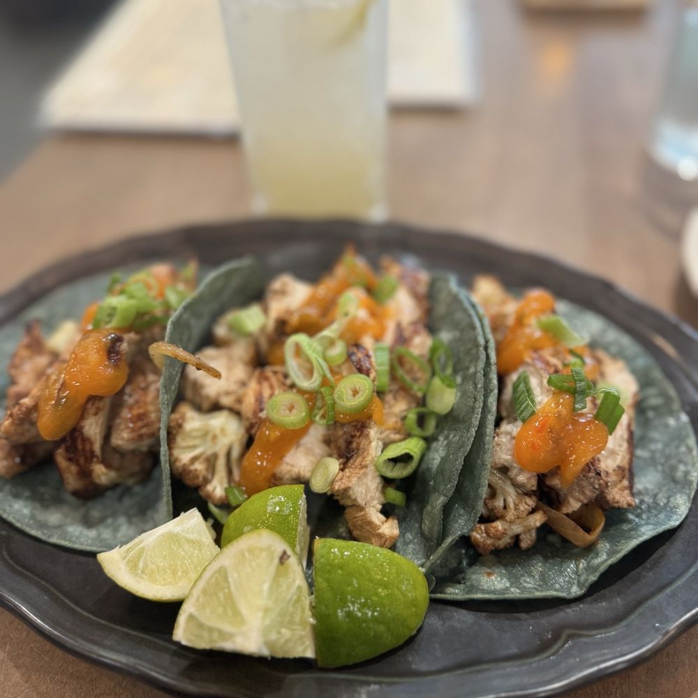 Oaxaca Club - Cauliflower tacos with chicken added, Endless Summer mocktail - New Mexican Cuisine Near Me - Jacksonville Beach, Florida Oaxaca Club - Cauliflower tacos with chicken added, Endless Summer mocktail - New Mexican Cuisine Near Me - Jacksonville Beach, Florida