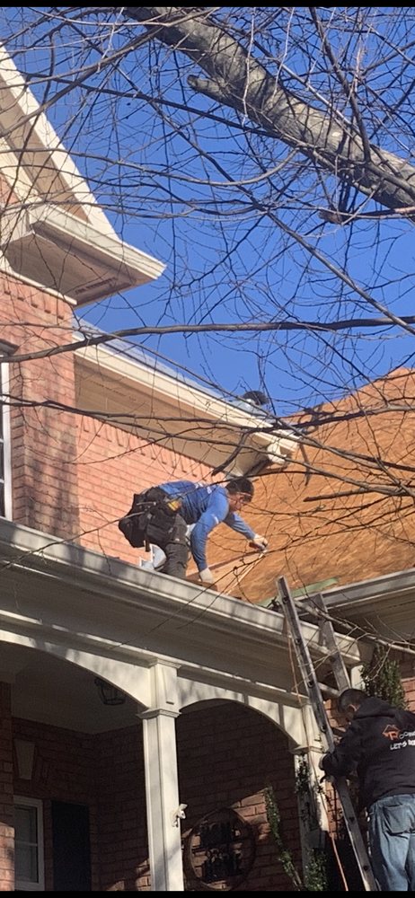 Slide of Whitaker Roofing Company