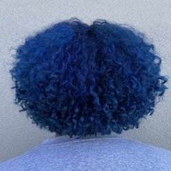 Curls by Dezi - Creative Color + Cut.