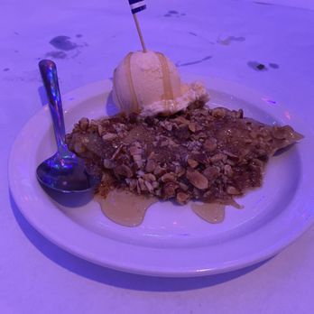 Poseidon's Greek Restaurant - Baklava à la mode. It is served warm with ice cream. So creative and absolutely delicious. - Greek Near Me - Lafayette, Louisiana Poseidon's Greek Restaurant - Baklava à la mode. It is served warm with ice cream. So creative and absolutely delicious. - Greek Near Me - Lafayette, Louisiana