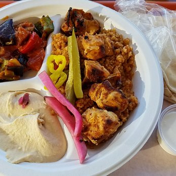 Choupli Wood Fired Kabob - Chicken kabob over bulgur - Mediterranean Near Me - Lansing, Michigan Choupli Wood Fired Kabob - Chicken kabob over bulgur - Mediterranean Near Me - Lansing, Michigan