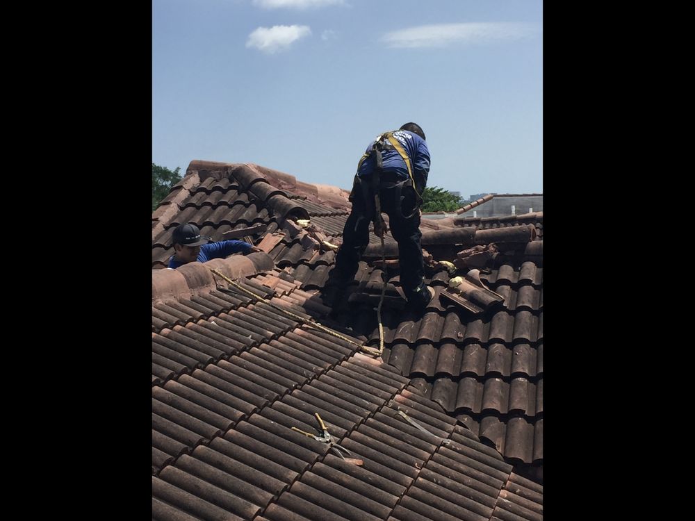 Slide of V & A Roofing