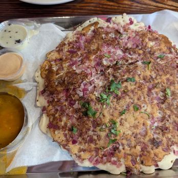 Jalli Kattu - Onion utthapam - Indian Near Me - Katy, Texas Jalli Kattu - Onion utthapam - Indian Near Me - Katy, Texas