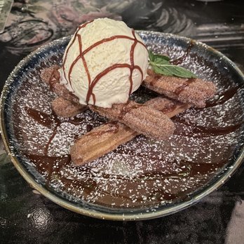 La Puerta - Churro with vanilla ice cream - Mexican Near Me - San Diego, California La Puerta - Churro with vanilla ice cream - Mexican Near Me - San Diego, California
