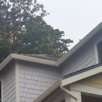 Astro Roofing - Roof is clean, and the white part is the moss treatment. - Roofing Near Me - Kirkland, Washington