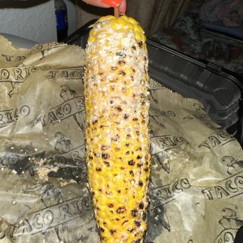 Tacomoli - a corn cob on a piece of tin foil - Food Delivery Services Near Me Tacomoli - a corn cob on a piece of tin foil - Food Delivery Services Near Me