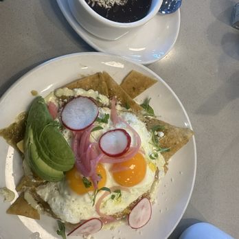 Poached Kitchen - Green Chilaquiles and black beans with coffee - Breakfast & Brunch Near Me - Irvine, California