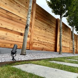 Six Bells - Alternating horizontal cedar panels with fully wrapped posts. Modern privacy to frame the yard.