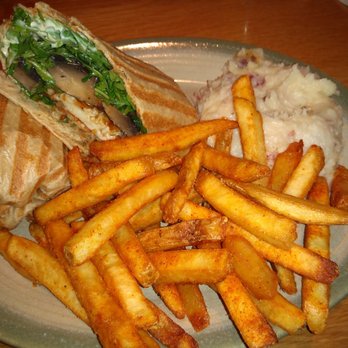 Nando's Peri-Peri - Portobello and Halloumi Wrap with two sides.  $12.55 - South African Near Me - Oakbrook, Illinois