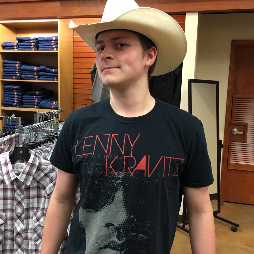 Boot Barn - Joshua trying on his first cowboy hat - Shoe Stores Near Me - Mesa, Arizona