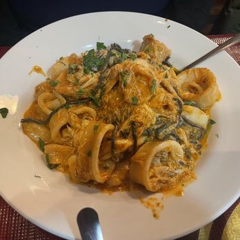 Benito One - Black Linguine with Shrimp, Calamari, and Crabmeat - Italian Near Me - New York, New York Benito One - Black Linguine with Shrimp, Calamari, and Crabmeat - Italian Near Me - New York, New York