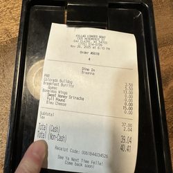 Fella's Loaded Goat - Receipt says $5.50 for cocktail and ad on table says $5 - interesting billing