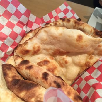 Roti Grill - Garlic and plain naan. - Indian Near Me - Dallas, Texas Roti Grill - Garlic and plain naan. - Indian Near Me - Dallas, Texas