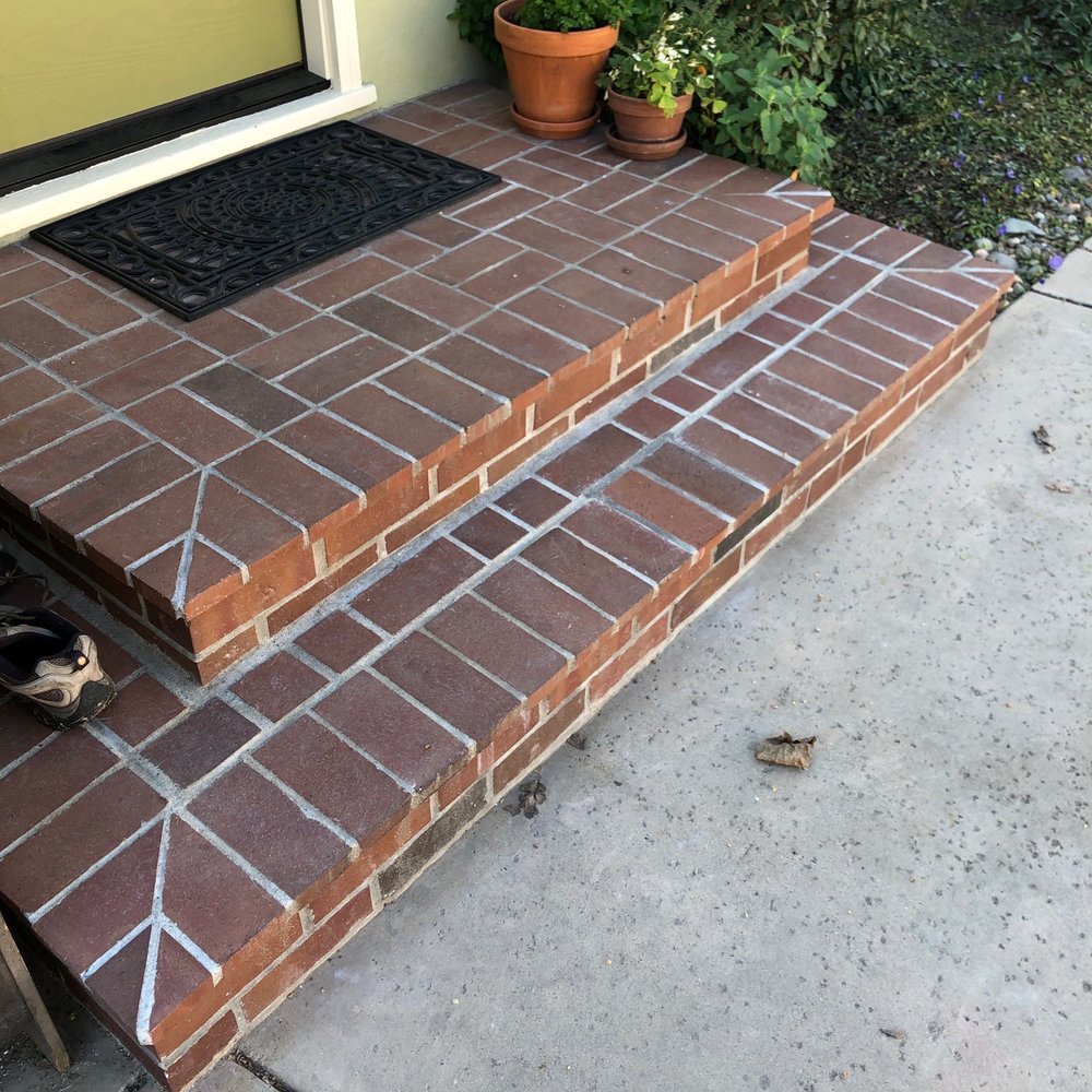 Side steps. Brick layered over existing concrete step. Side steps. Brick layered over existing concrete step.