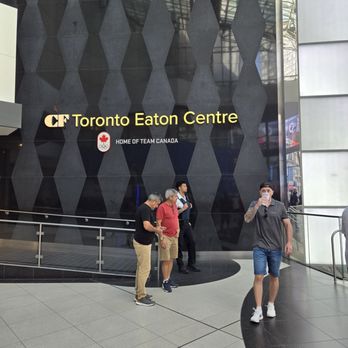 CF Toronto Eaton Centre - Sign near the entrance of the building - Shopping Centers Near Me - Toronto, Ontario CF Toronto Eaton Centre - Sign near the entrance of the building - Shopping Centers Near Me - Toronto, Ontario