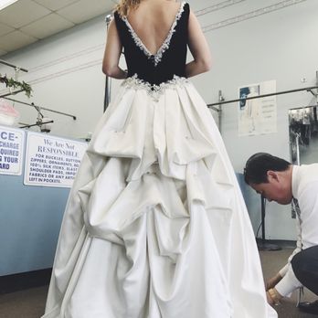 Crystal Palace Cleaners - Alterations & tailoring specialty, including wedding gowns (custom French bustle shown), prom dresses, and other evening wear - Sewing & Alterations Near Me - Holmdel, New Jersey