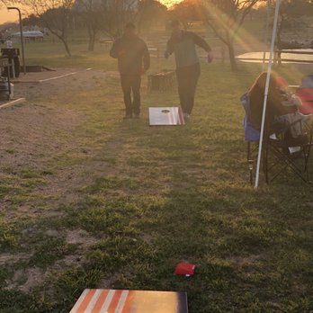 Black Rock Park - Playing corn hole outside the cabin - Parks Near Me - Buchanan Dam, Texas Black Rock Park - Playing corn hole outside the cabin - Parks Near Me - Buchanan Dam, Texas