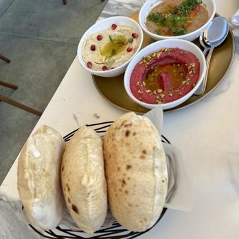 Ammatoli - fresh pita and beet hummus with pistachio, roasted eggplant Muhammara Mezza, and Foul Mudammas Mezza aka bean dip - Mediterranean Near Me - Long Beach, California Ammatoli - fresh pita and beet hummus with pistachio, roasted eggplant Muhammara Mezza, and Foul Mudammas Mezza aka bean dip - Mediterranean Near Me - Long Beach, California