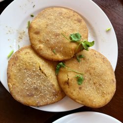 Dal poori (fried flatbreads stuffed with lentils)