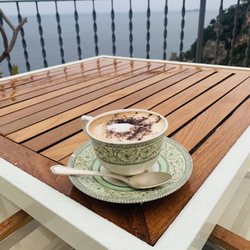 Hotel Punta Regina - Morning coffee in the rain