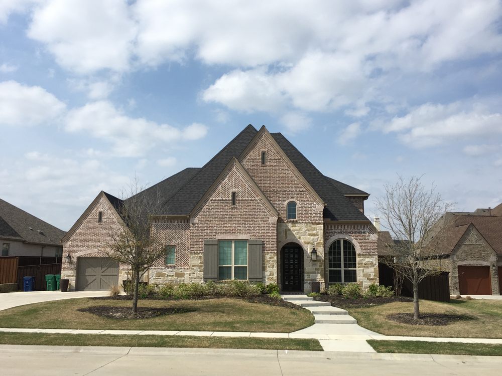 Slide of DNA Roofing & Construction