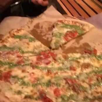 Cheese Board Pizza - pine nut pesto, arugula, fresh tomato, artichoke, local cheese, deliciousness. - Pizza Near Me - Berkeley, California Cheese Board Pizza - pine nut pesto, arugula, fresh tomato, artichoke, local cheese, deliciousness. - Pizza Near Me - Berkeley, California