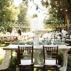 The Historic Farmhouse 14 - Gorgeous outdoor area with farm tables and market lights.