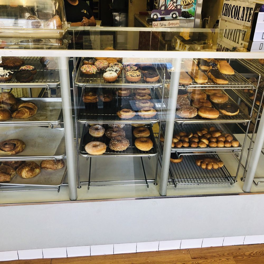Royal Donuts - a display case full of donuts - Donuts Near Me - Carson, California