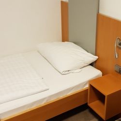 Dom Hotel - Bett