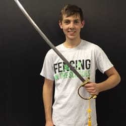 Advance Fencing & Fitness Academy - David showing off his first place trophy.