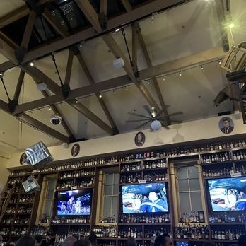 School House Kitchen & Libations - Old school desks hang from the ceiling - New American Near Me - Arvada, Colorado