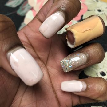 Lotus Nails - After two weeks. Haven't done anything different than I usually do. Chipped gel and a broken nail two weeks in. - Nail Salons Near Me - Gaithersburg, Maryland