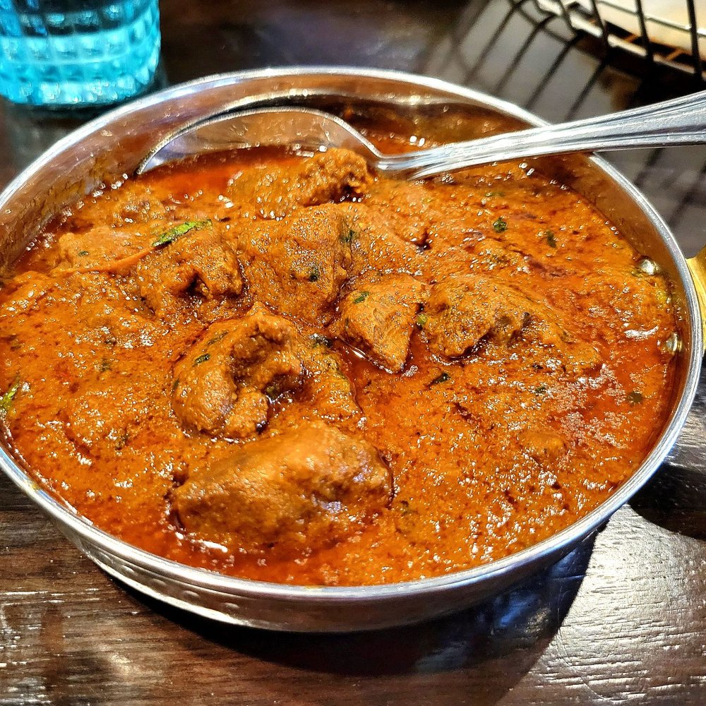IndoChen - Old Town - Butter Chicken had tandoori dark meat chicken in a creamy tomato and cashew curry sauce. - Indian Near Me - Alexandria, Virginia IndoChen - Old Town - Butter Chicken had tandoori dark meat chicken in a creamy tomato and cashew curry sauce. - Indian Near Me - Alexandria, Virginia