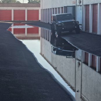 Public Storage - Flood water not on other rows and a steeper hill than photo shows. Dolleys don't stay put and got walk uphill with file cabinets etc - Self Storage Near Me - Tempe, Arizona